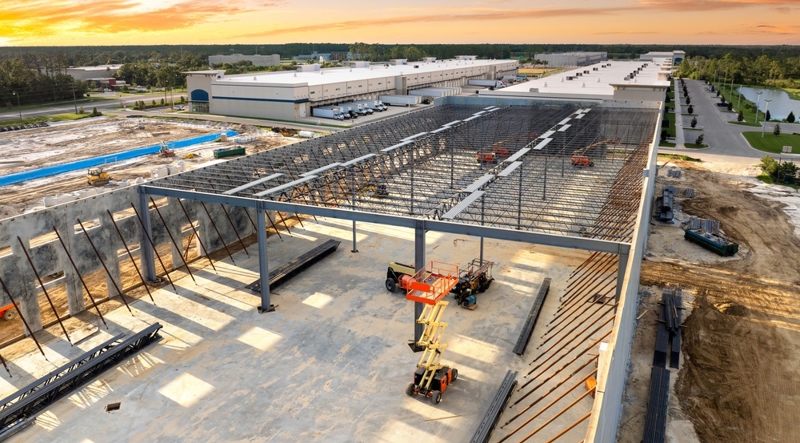 Steel building under construction for production site