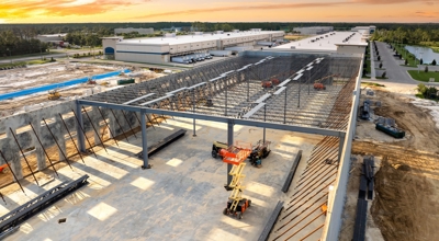 Steel building under construction for production site