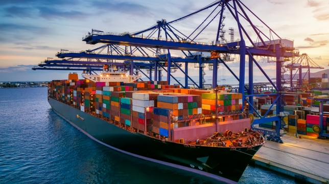 Cargo ship waiting at dock amid Section 122 Tariffs